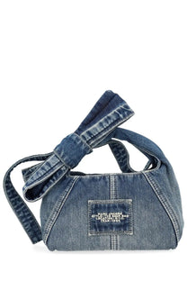 Marc Jacobs women’s denim shoulder bag in blue with a prominent bow handle and branded front patch
