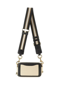 Marc Jacobs women’s Borsa the Snapshot white camera bag in black and cream with a striped shoulder strap