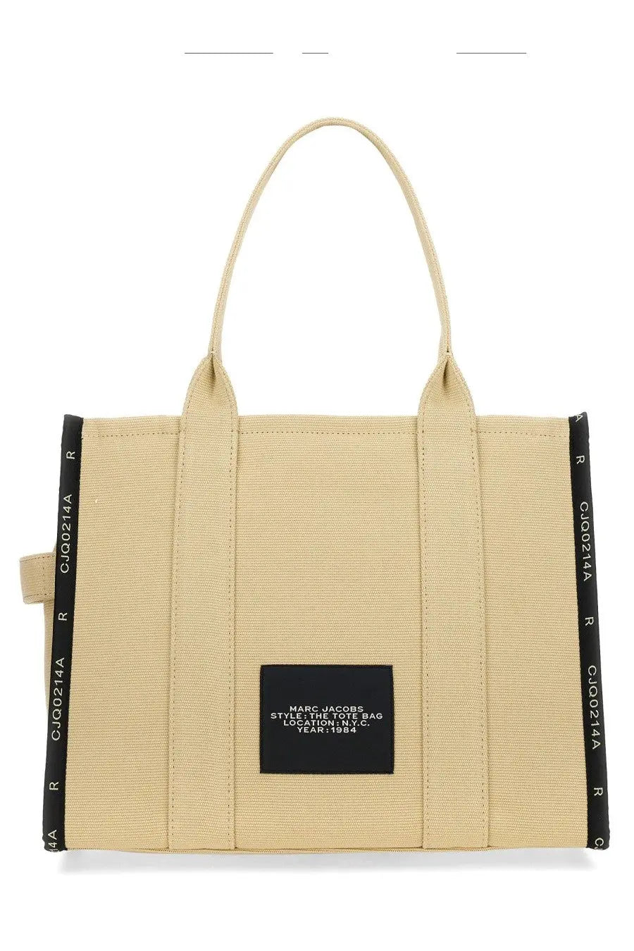 Beige canvas marc jacobs tote bag with black ribbed side panels and central black label in new york city style