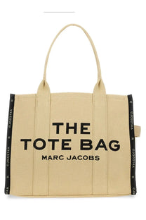 Marc Jacobs women’s borsa the tote large beige canvas bag with black embroidered text and branded side straps