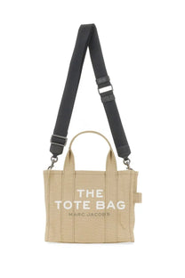 Beige canvas marc jacobs womens borsa the tote small with black adjustable strap and white logo lettering
