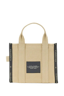 Marc Jacobs women’s borsa the tote small beige canvas bag with black ribbed side panels and central black label