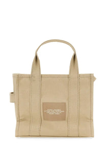 Beige canvas tote bag with matching marc jacobs patch label style the tote bag location n.y.c. from marc jacobs womens borsa