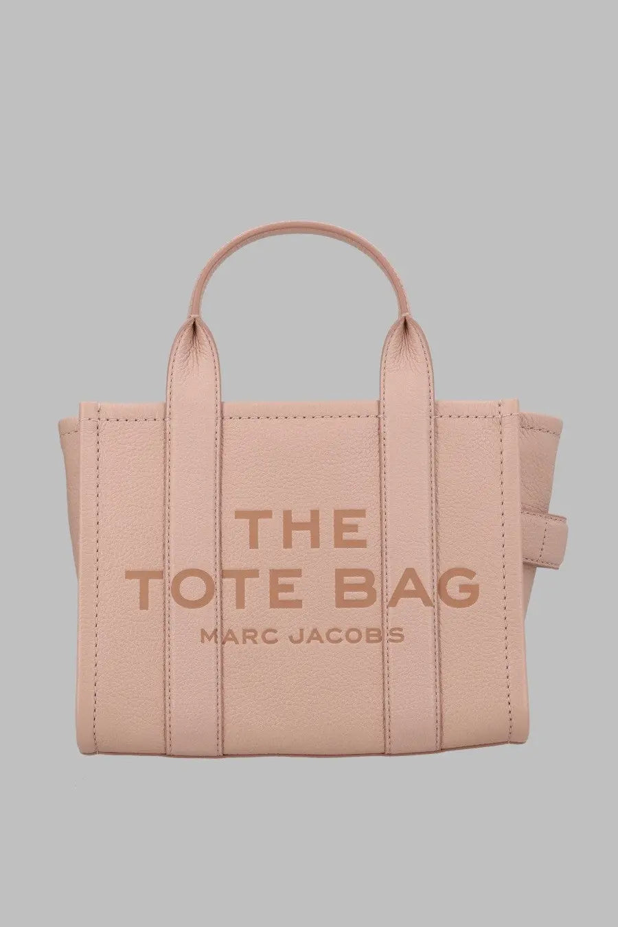 Marc Jacobs women’s blush pink leather tote bag with embossed the tote bag and marc jacobs branding