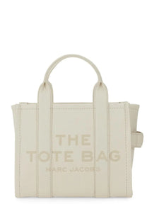 Cream-colored canvas tote bag marc jacobs embossed branding marc jacobs womens borsa the tote small white