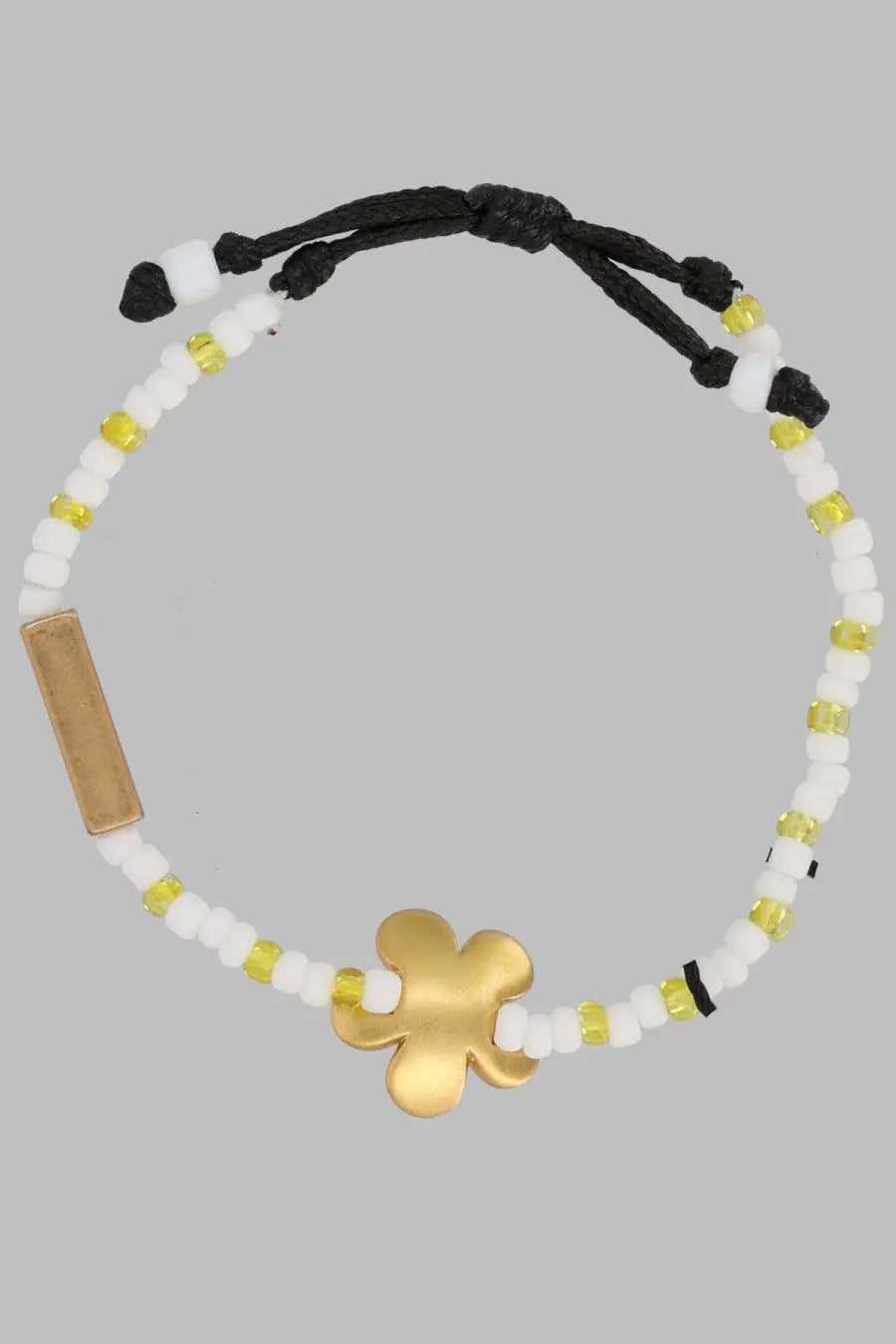 Marc Jacobs women’s bracciale daisy multicolor black cord bracelet with white yellow beads gold four leaf clover charm and tag
