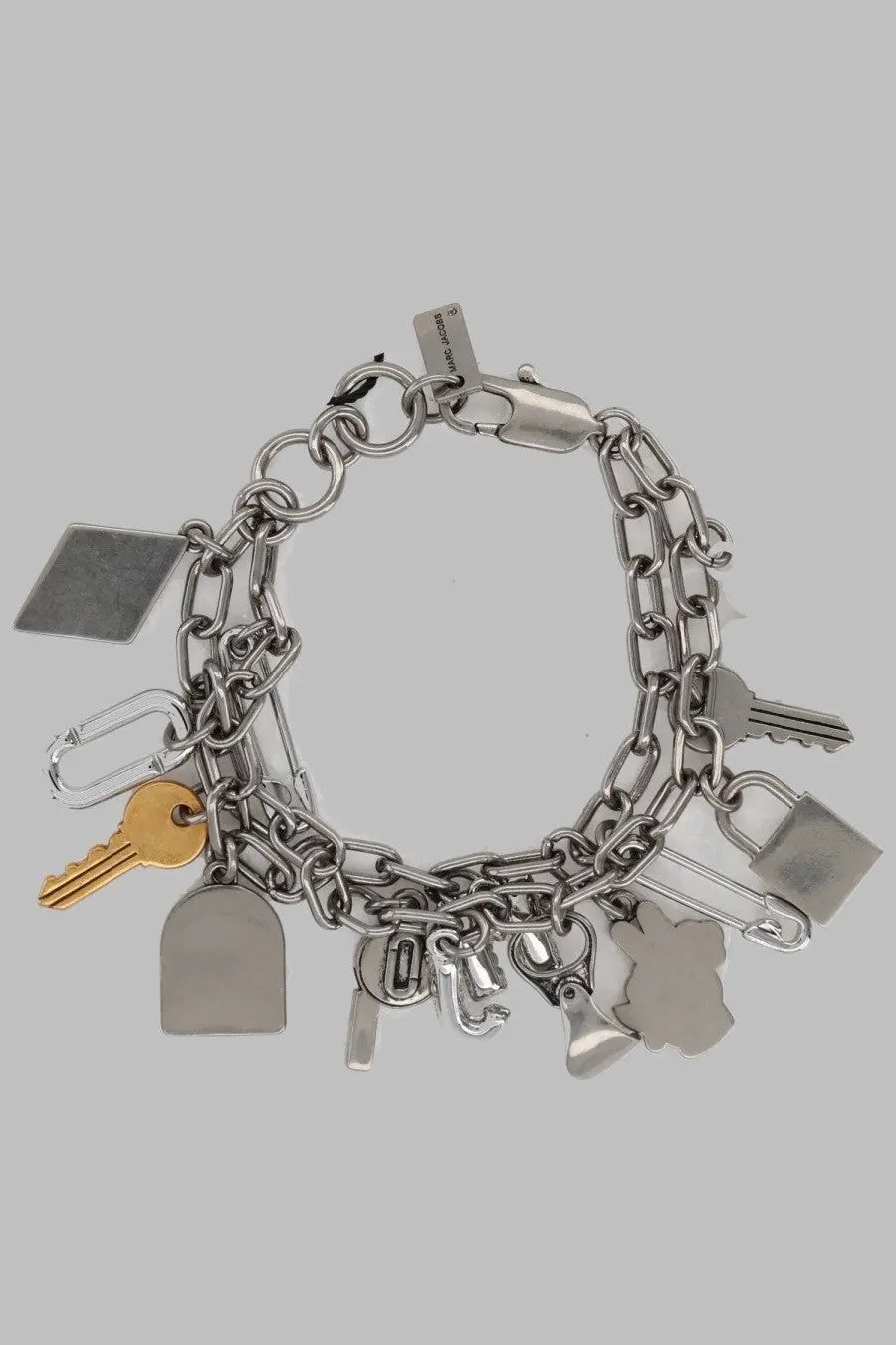 Silver-toned Marc Jacobs women’s chain bracelet with metallic key lock and abstract charms bracciale pop america silver