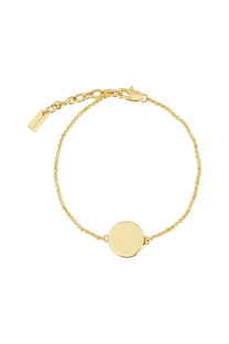 Gold-toned circular disc charm bracelet with delicate chain and lobster clasp featuring marc jacobs button design
