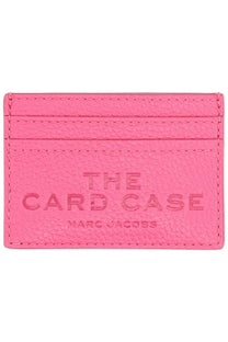 A vibrant pink leather card case embossed with the card case and marc jacobs branding for women