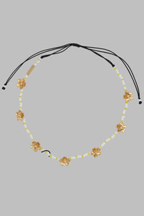 Marc Jacobs women’s collana daisy multicolor necklace with black cord, golden flower charms, white and pale yellow beads