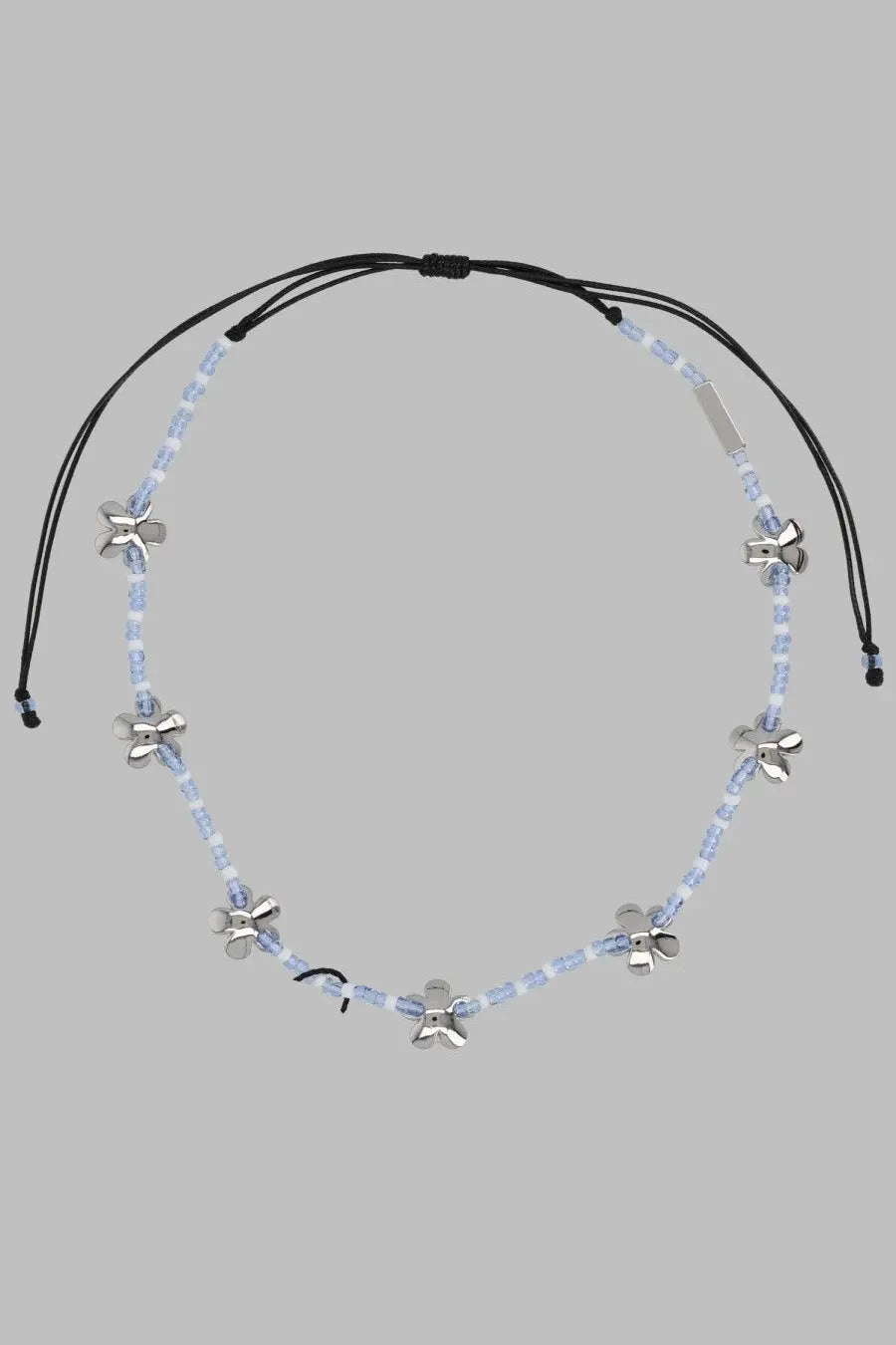 Marc Jacobs women’s collana daisy silver necklace with light blue translucent beads and silver flower charms on black cord