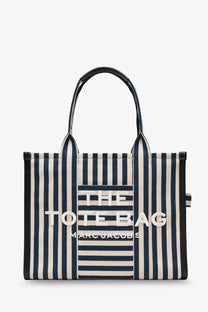 Marc Jacobs women’s large tote canvas handbag in navy and cream stripes with black leather handles and white embroidery