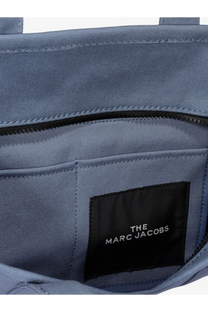 Marc Jacobs women’s the medium tote denim crossbody bag in navy blue woven fabric with black interior lining and branded label
