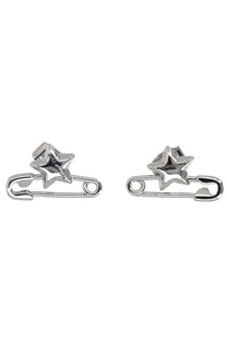 Silver star-shaped safety pin earrings by marc jacobs with a polished metallic finish