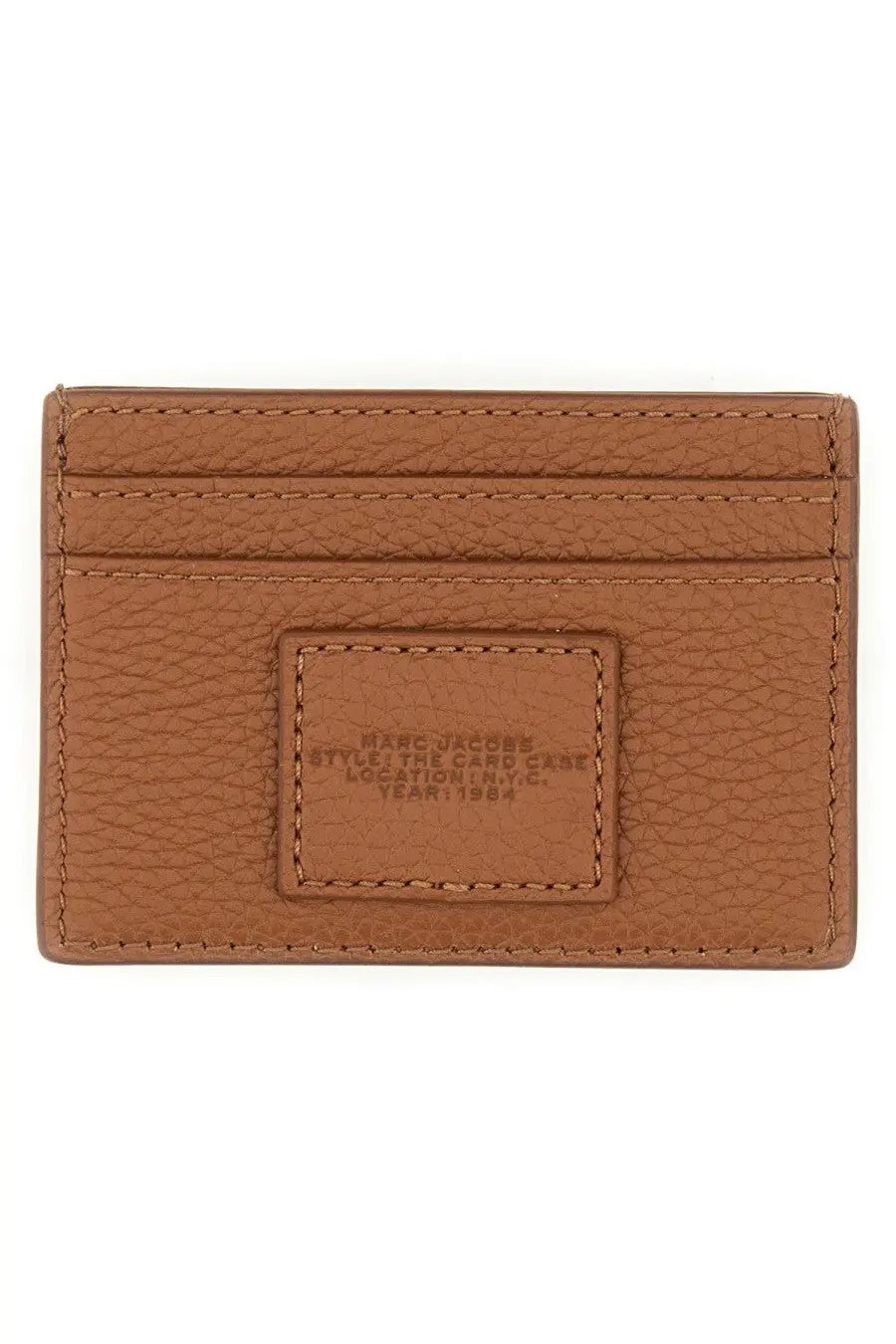 Tan leather marc jacobs women’s portacarte card case with embossed branding on a rectangular patch brown