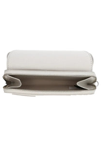 A sleek off-white leather Marc Jacobs women’s portafoglio shades wallet with smooth texture and silver zipper closure