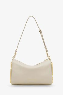 Marc Jacobs women’s snapshot hammered leather shoulder bag in cream with gold-tone accents and adjustable strap