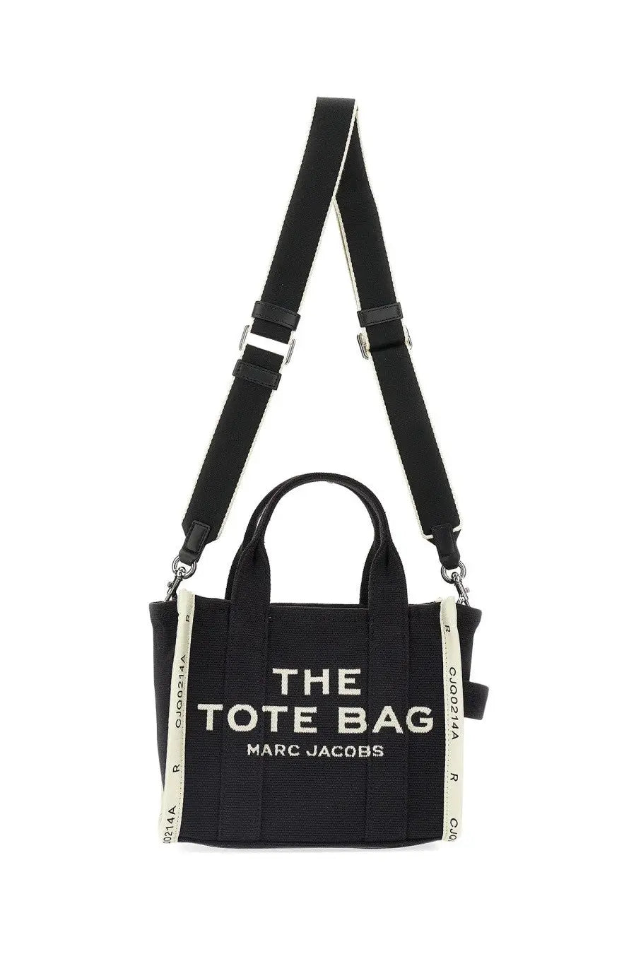 Marc jacobs women’s small black canvas tote bag with white lettering and striped shoulder straps