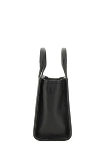 Marc Jacobs women’s the tote bag small black in black pebbled leather with structured handles shown from the back