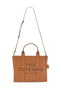 Marc Jacobs women’s medium tote bag in beige tan leather with the tote bag and marc jacobs embossed lettering