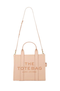 Beige leather marc jacobs the tote bag with gold-tone hardware and embossed branding shown from the front