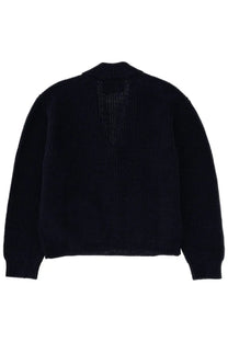Back view of Margaret Howell women’s black ribbed knit sweater with subtle textured pattern on the back
