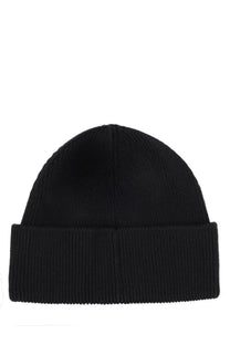 Black ribbed knit beanie with folded cuff by Marine Serre unisex cap in black