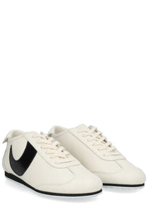 Marine serre women’s astra sneaker white cream leather with black nike swoosh and matching black rubber soles