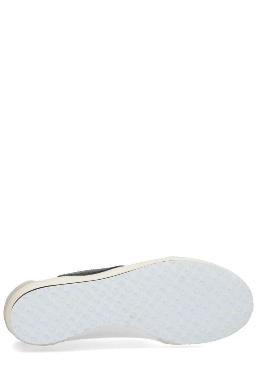 White rubber sole with textured dotted pattern and black stitching on the edge of marine serre women’s astra sneaker