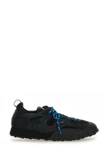 Marine Serre women’s ms rise ii sneaker black with blue laces and textured rubber sole close up of side view