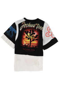 The back of a Marine Serre women’s regenerated white short-sleeved shirt with vibrant sunset and Joshua tree graphics