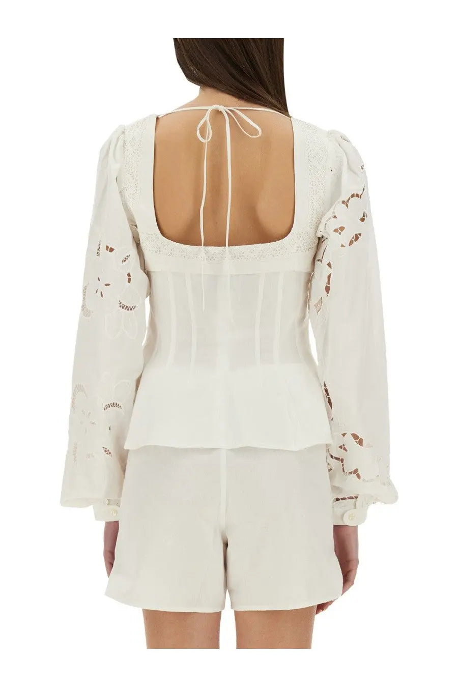 Marine serre womens upcycled linen white eyelet blouse with long sleeves and square back tied with ribbon shown from back