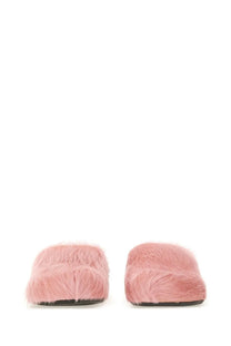 Marni men’s fussbett sabot blue shown as pink fuzzy mules with soft plush texture and black soles