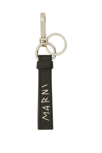 Marni men’s keychain in black leather with silver metal clasp and ring featuring white marni embossing vertically