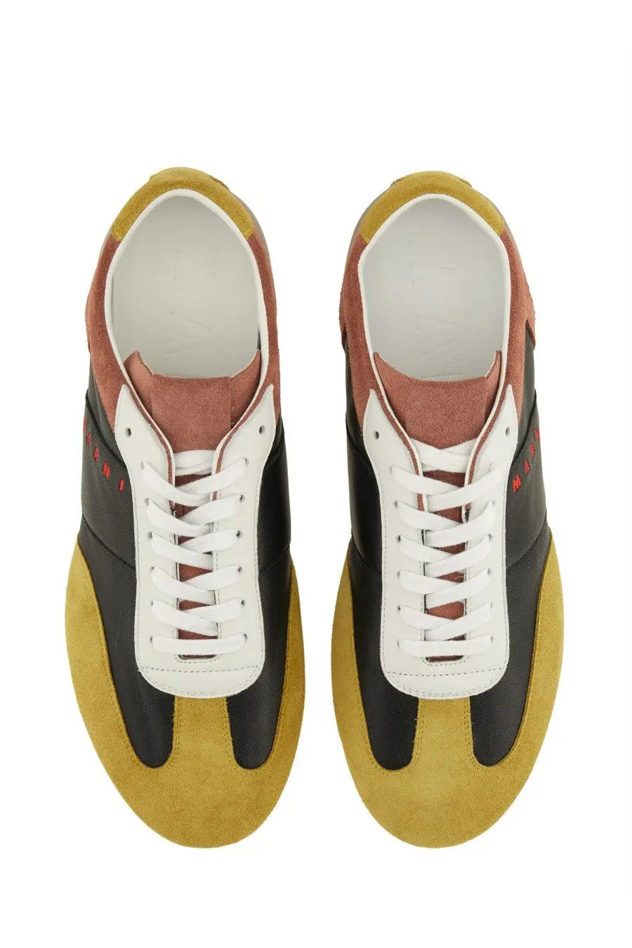 Pair of marni men’s leather sneakers with color blocked suede in mustard yellow black and terracotta brown accents