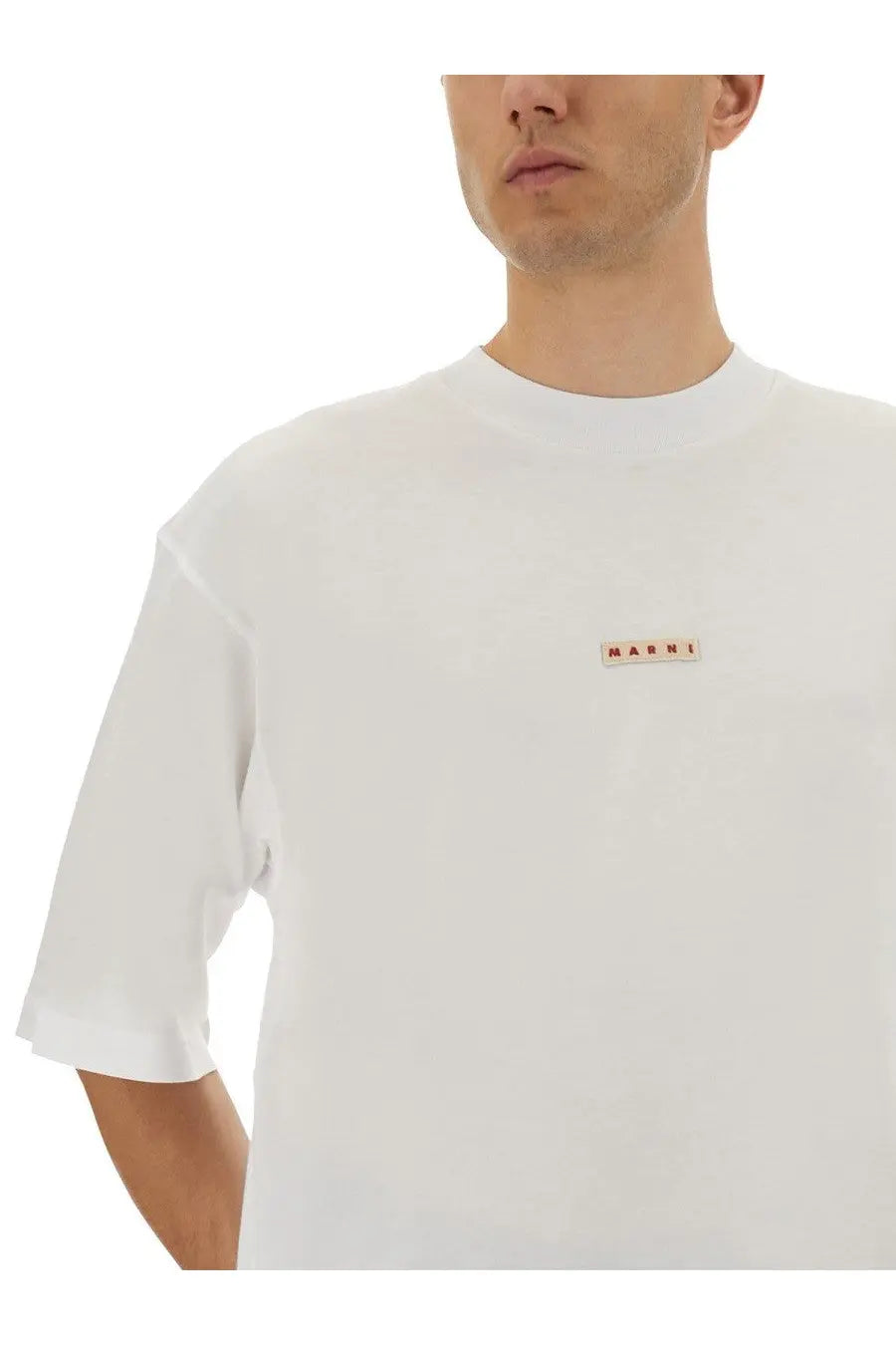 White Marni men’s short-sleeved cotton t-shirt with a small rectangular logo patch on the chest