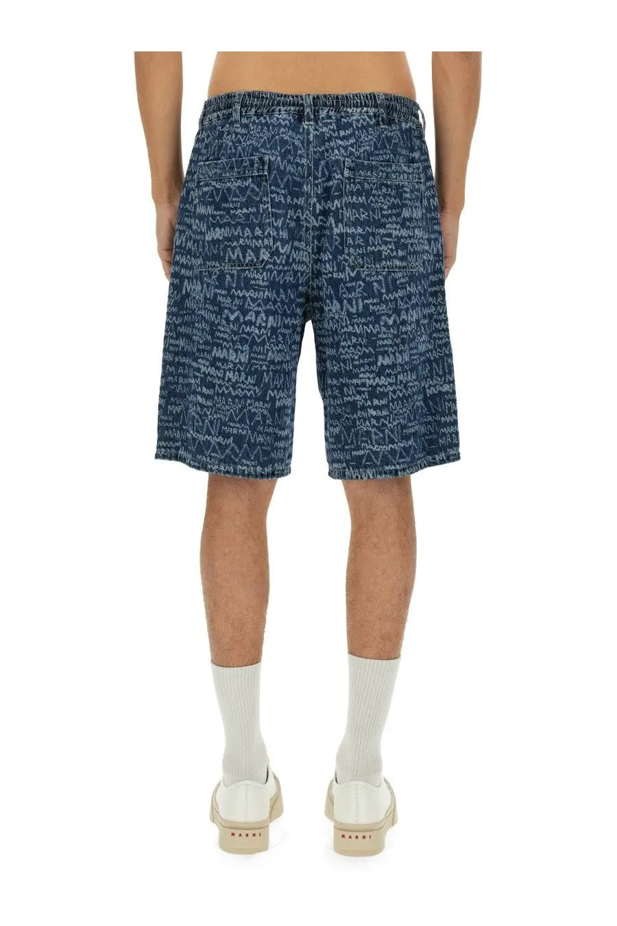 Marni men’s denim blue shorts featuring white graffiti style scribble print on blue denim fabric
