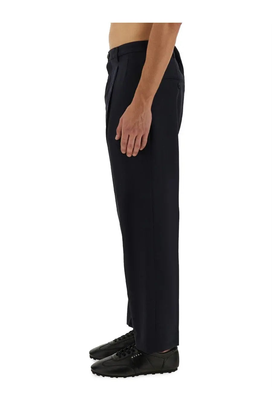 Black tailored wool trousers with sleek straight-leg cut and subtle pleats at waistband from Marni men’s collection