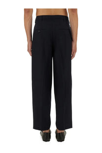 Black tailored wool wide-leg trousers with subtle waist pleats from marni mens wool pants blue collection