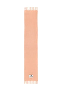 A soft peach-colored cashmere scarf with delicate fringe and a small brand label near the bottom