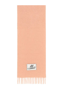 A soft peach-colored marni women’s alpaca scarf with subtle textured weave and fringed ends