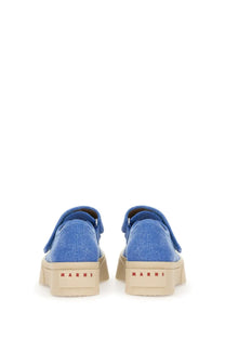 Back view of marni women’s mary jane sneaker in blue denim canvas with beige rubber soles and red marni branding on heel
