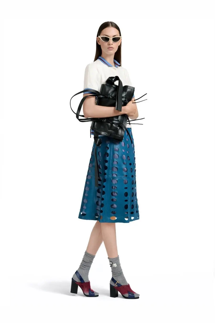 Black leather backpack with multiple straps and minimalist design shown from the back in Marni women’s polo white product