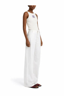 Marni women’s beige ribbed knit sleeveless tank top with small blue and white logo patch on the chest