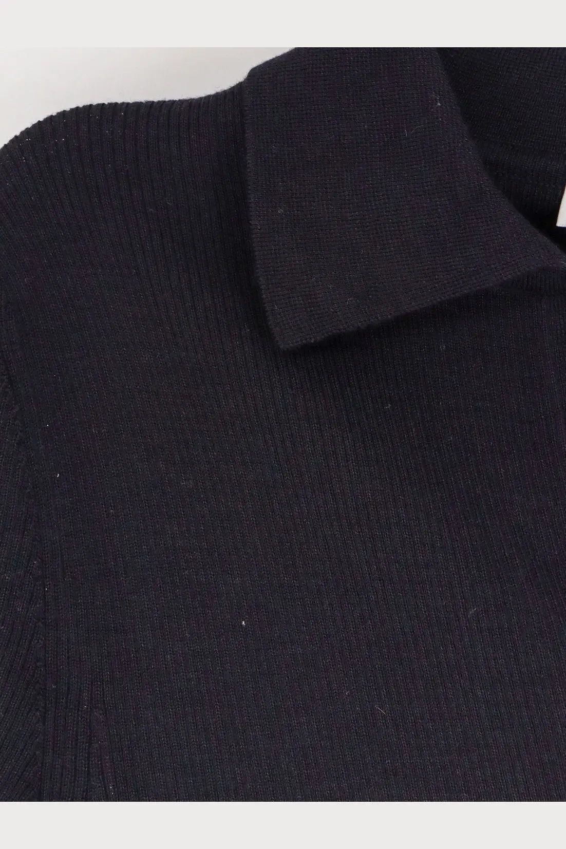 Black ribbed knit polo shirt with a structured collar made from virgin wool by Max Mara