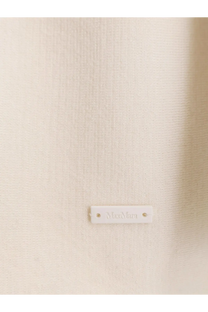 A minimalist white rectangular label embossed with moonara on a max mara women’s aster virgin wool cardigan white