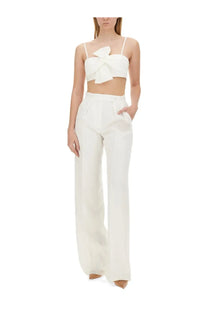 White satin crop top with large front bow paired with Max Mara women’s bridal larynx pants white