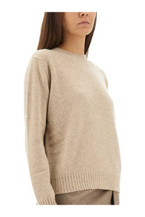 Max Mara women’s beige cashmere cinema sweater with soft ribbed hem and cuffs for cozy stylish wear