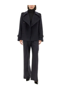 Max Mara women’s black double-breasted trench coat with structured shoulders and belted cuffs for stylish outerwear