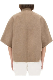 Max Mara women’s beige woolen coat Leticia with subtle textured weave and wide flowing sleeves viewed from the back